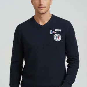 V-ringad tröja med stickat mönster och lappar, mörkblå